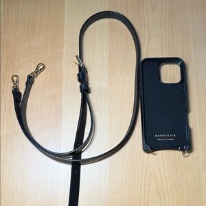 Bandolier Black Phone Case with Gold Accents for iPhone 16 Pro Max